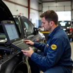 An AAA Certified Technician Performing Diagnostics