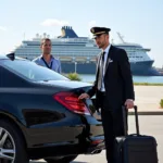 Chauffeur assisting passenger with luggage at Port Canaveral