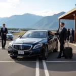 Black car service picking up clients at Jackson Hole Airport