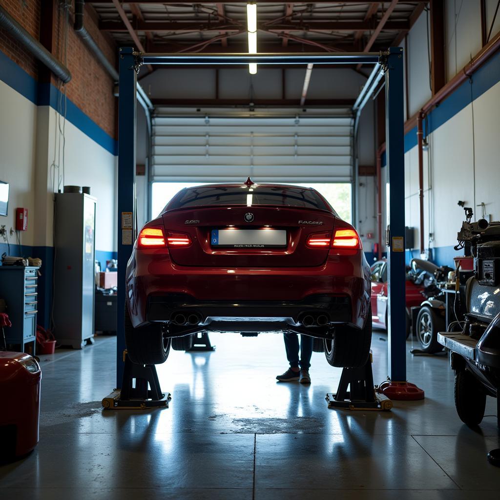 Car undergoing maintenance in a Boardman garage