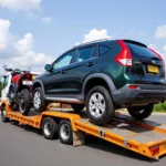 Car and bike transportation services in Greater Noida