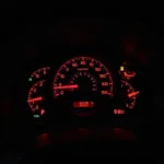 Car Dashboard Illuminated with Warning Lights