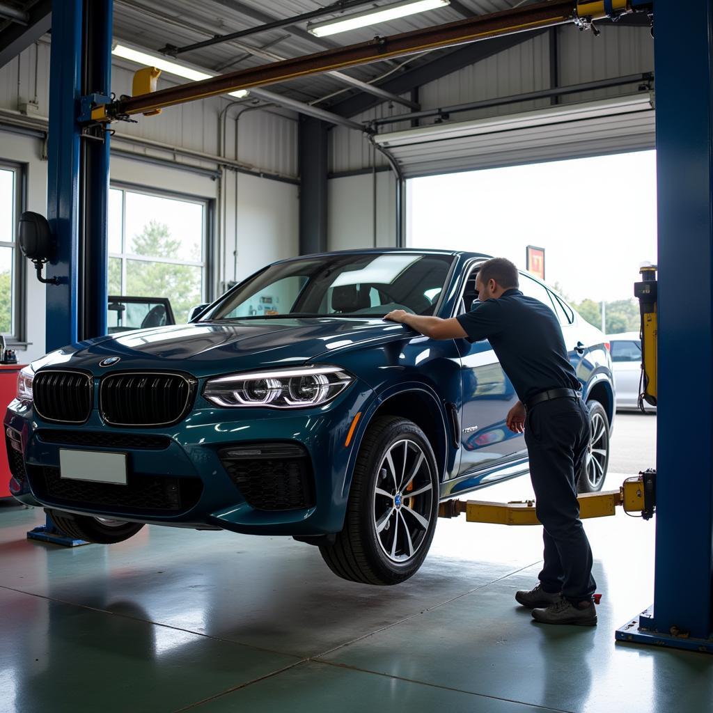 Car getting serviced at a garage