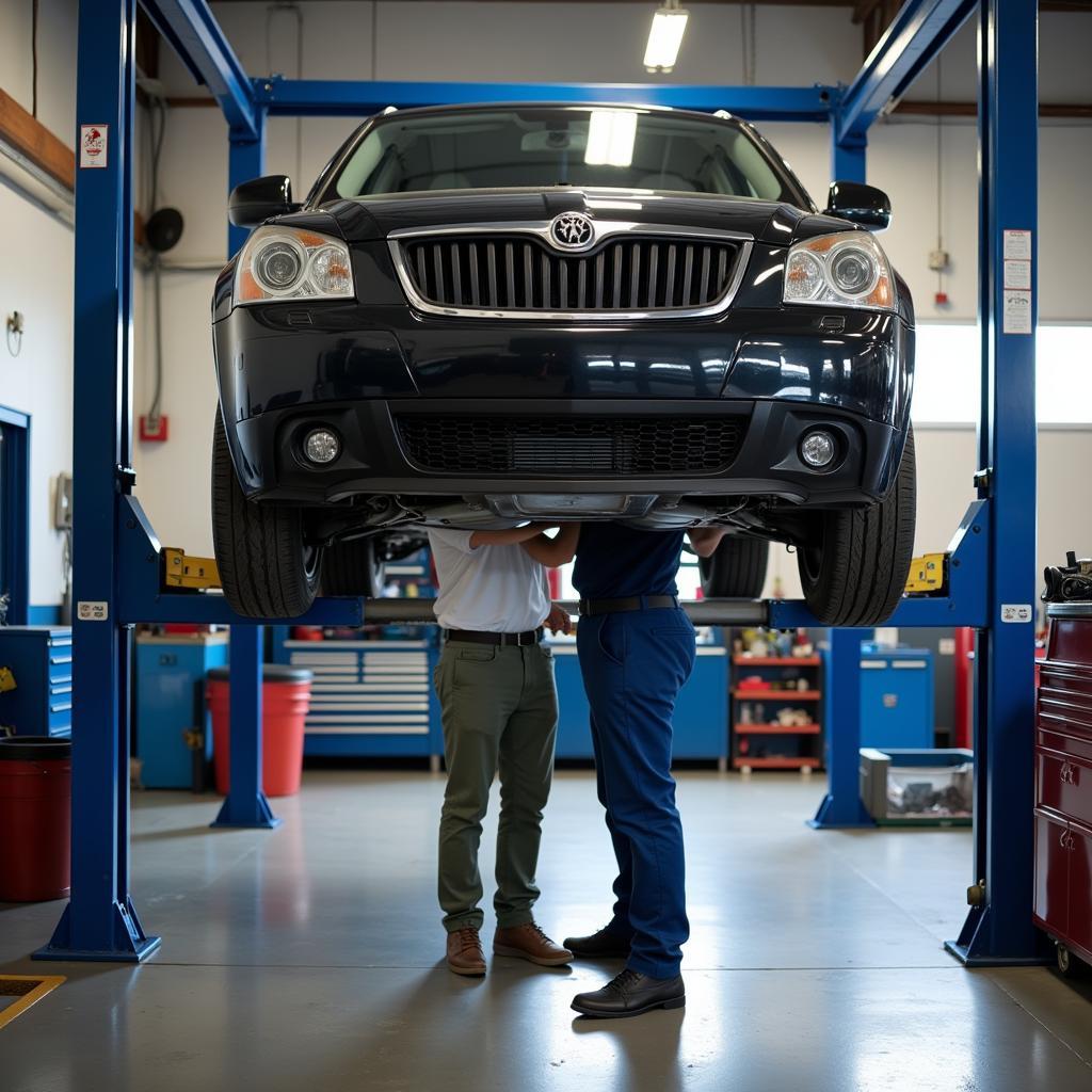 Car on a hydraulic lift in a service center