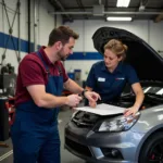 Customer discussing car issue with a mechanic in Brunswick