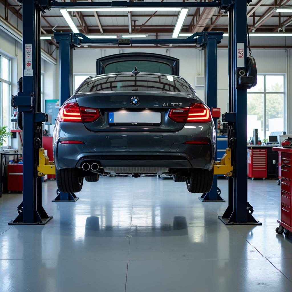 Car service center with vehicle on lift