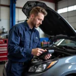 Experienced mechanic inspecting a car in a Nedlands garage