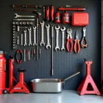 Essential car service tools laid out in a home garage