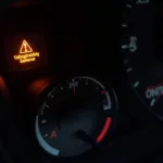 Car Dashboard Showing Service Warning Light