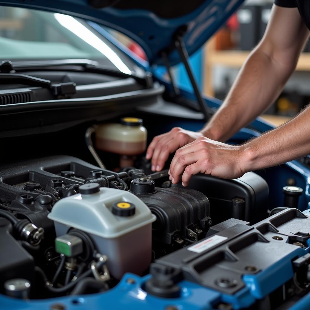 Mechanic Inspecting Engine Compartment