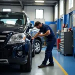 Mechanic Inspecting Car in Mansfield