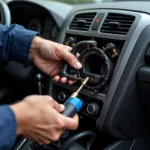 Mechanic Inspecting Car A/C System