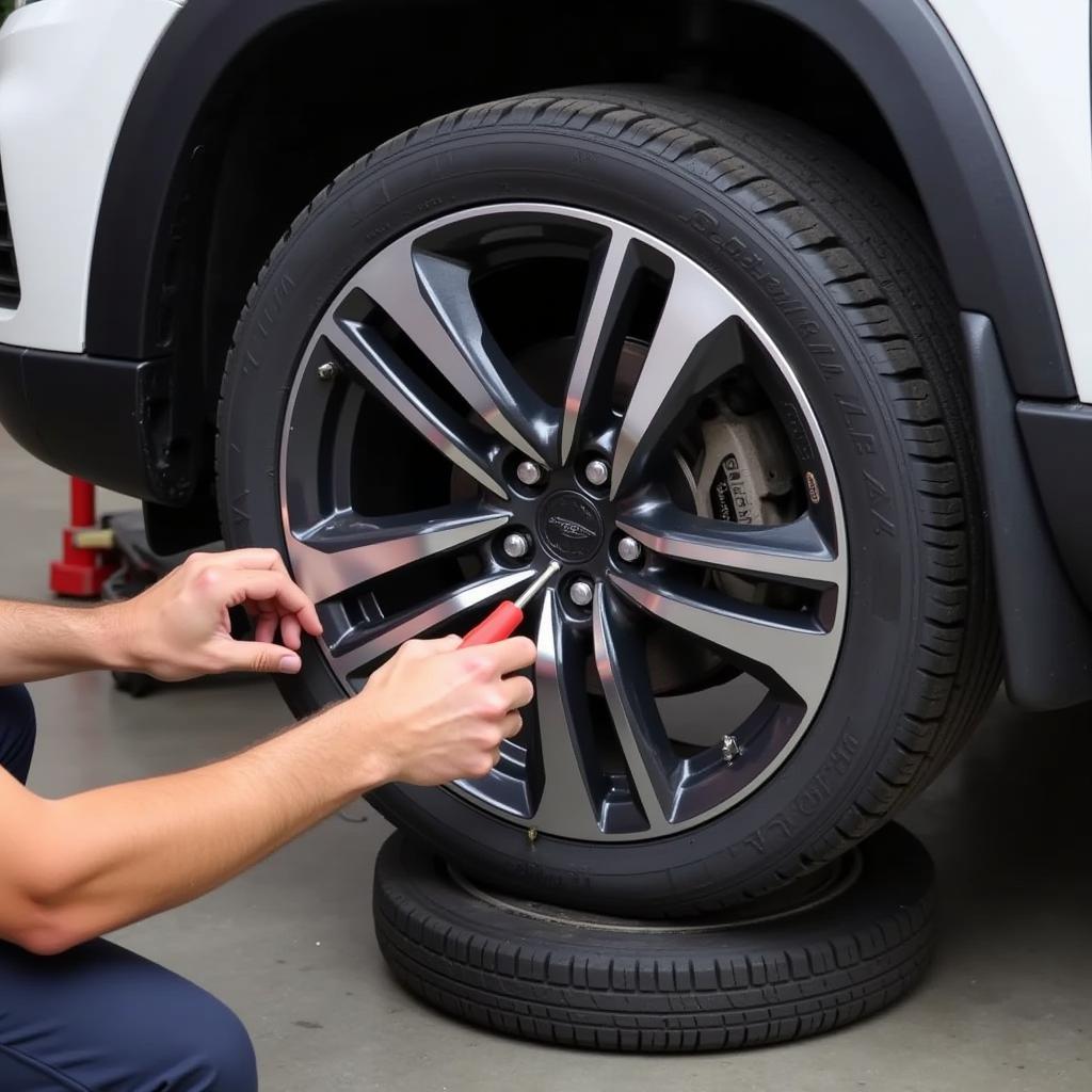 Mechanic Inspecting Wheel Spacers