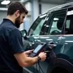 Skilled Mercedes technician using advanced diagnostic equipment on a mini Mercedes in Loveland