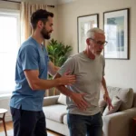 Physical therapist helping elderly man