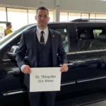 Private chauffeur waiting to pick up clients at LAX for San Diego trip