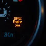 Service Engine Soon Light Illuminated on Car Dashboard