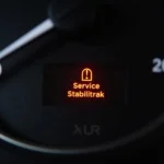 Service Stabilitrak Warning Light on Car Dashboard