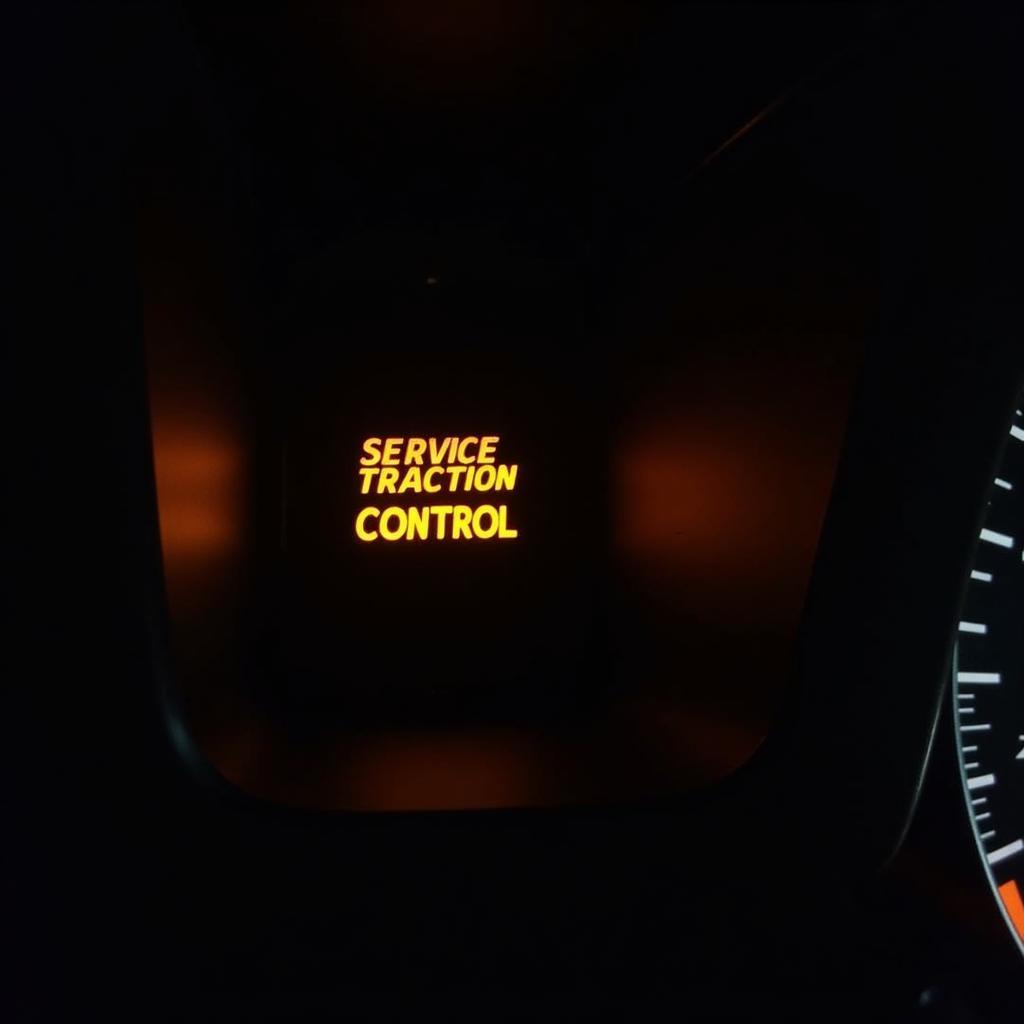 Car Dashboard Displaying "Service Traction Control" Light