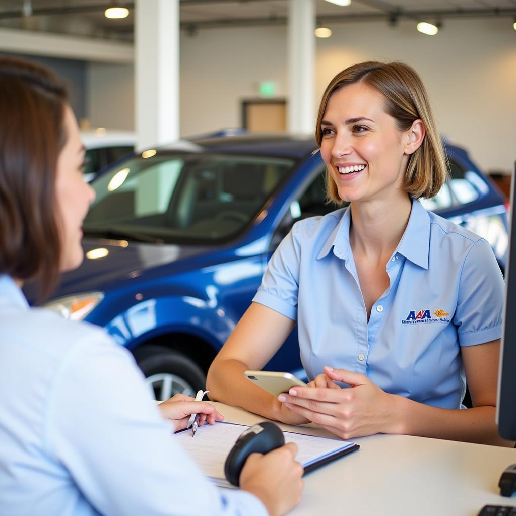 AAA Travel Agent Helping Customer Book Rental Car