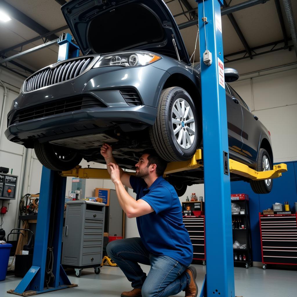 Car Being Serviced by Mechanic