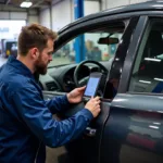 Mechanic Performing Diagnostics on a Vehicle