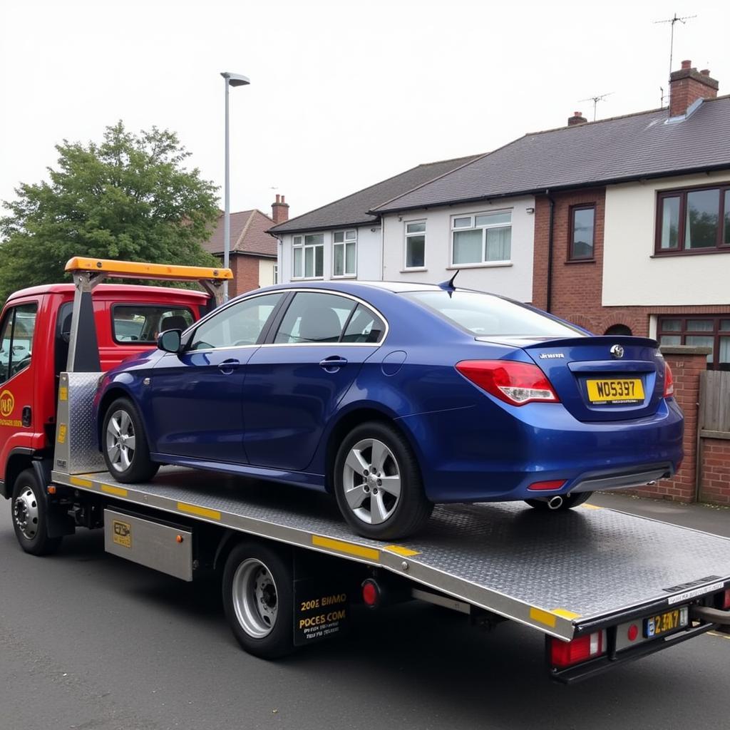 Tow Truck Picking Up a Car in Belfast