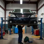 Saturn Car Being Serviced at an Independent Mechanic