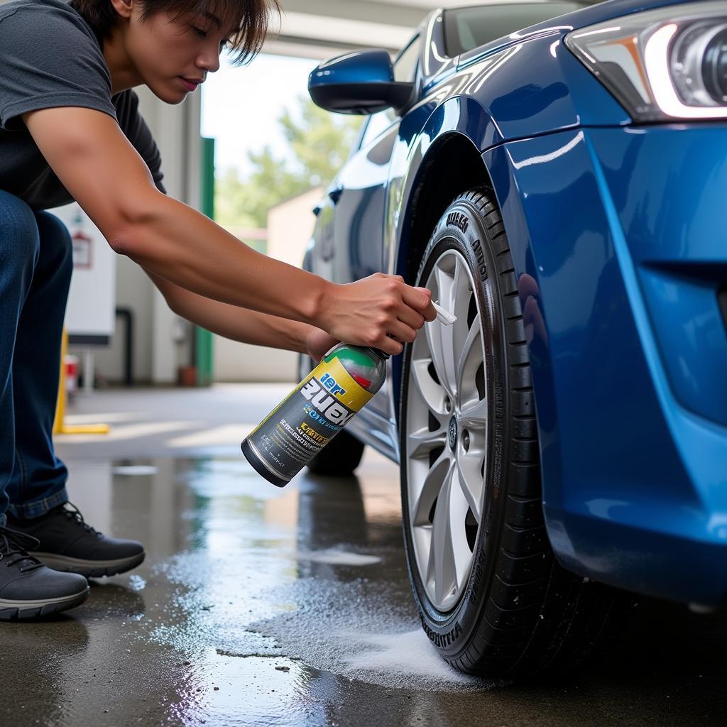 Applying Tire Cleaner at Self-Service Car Wash