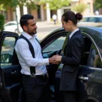 A chauffeur in a black suit opens the car door for a client in front of a luxury hotel.