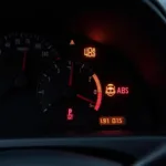 Car dashboard with multiple warning lights illuminated