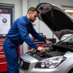 Mechanic Inspecting a Car in a Barnstaple Garage