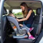 Parent Checking Car Seat Installation