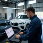 Technician Using Advanced Diagnostic Tools for Premium Car Care