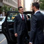 Professional chauffeur opening car door for passenger in Dallas