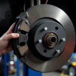 Inspecting brakes during a 50000 km service