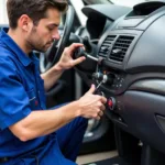 Car AC Service Technician Performing Maintenance