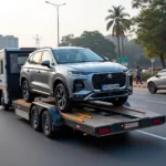 Car carrier services in Delhi transporting a vehicle on a trailer.