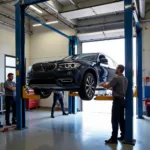 Car undergoing routine maintenance in Harborne