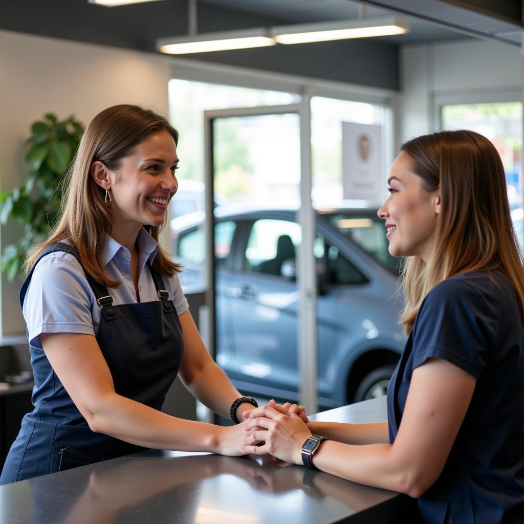 Customer Discussing Car Service at Reception