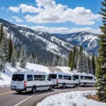 Scenic drive from Denver Airport to Breckenridge: An SUV car service driving through the picturesque mountain roads on the way to Breckenridge ski resort.