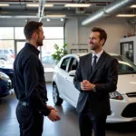 Customer talking to a car service advisor in Ithaca, NY